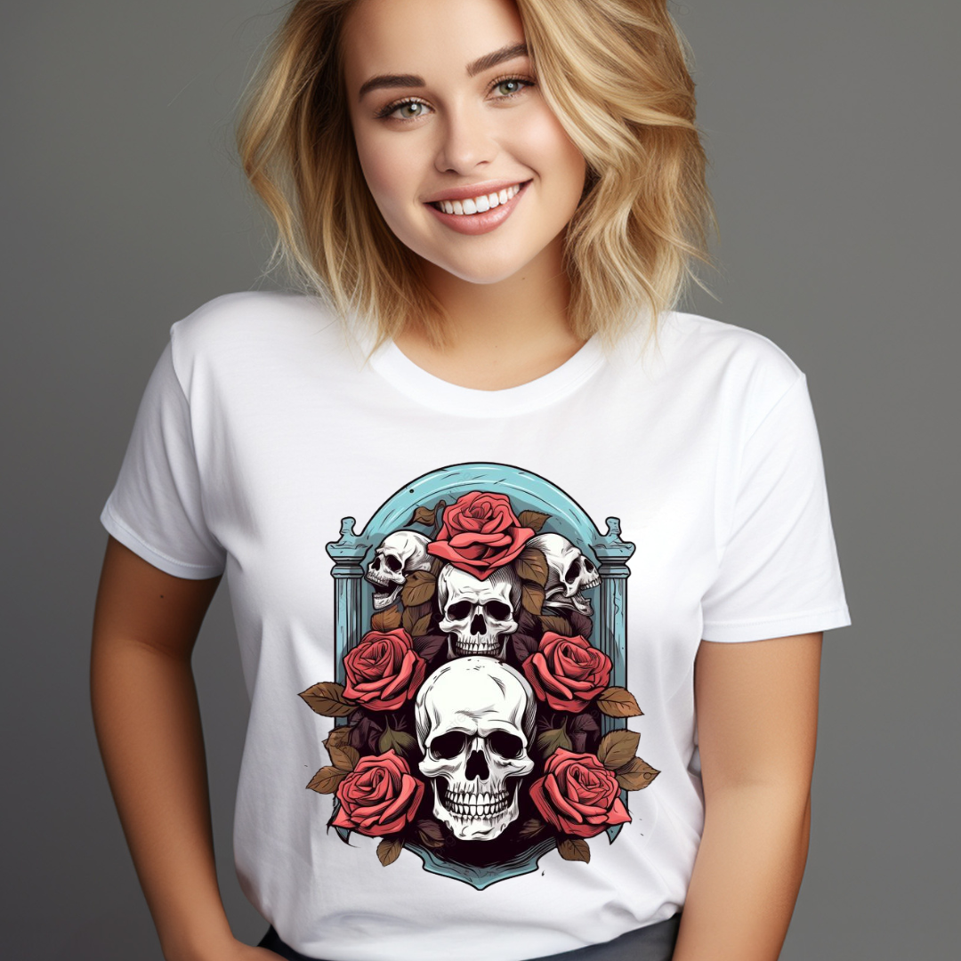 Woman wearing a white artistic skull rose graphic tee with detailed skulls and red roses design
