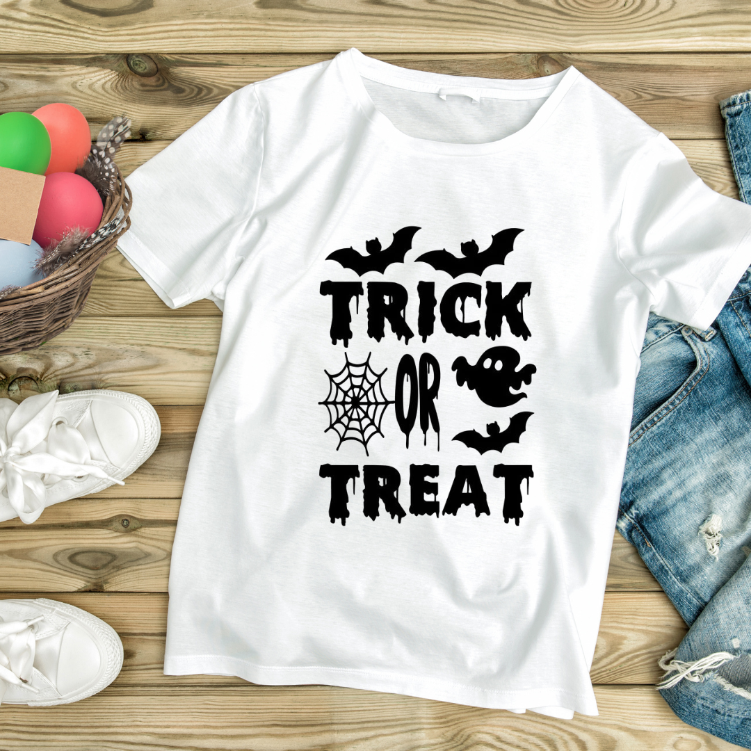 White custom Halloween t-shirts with black Trick or Treat design featuring bats, spider web, and ghost