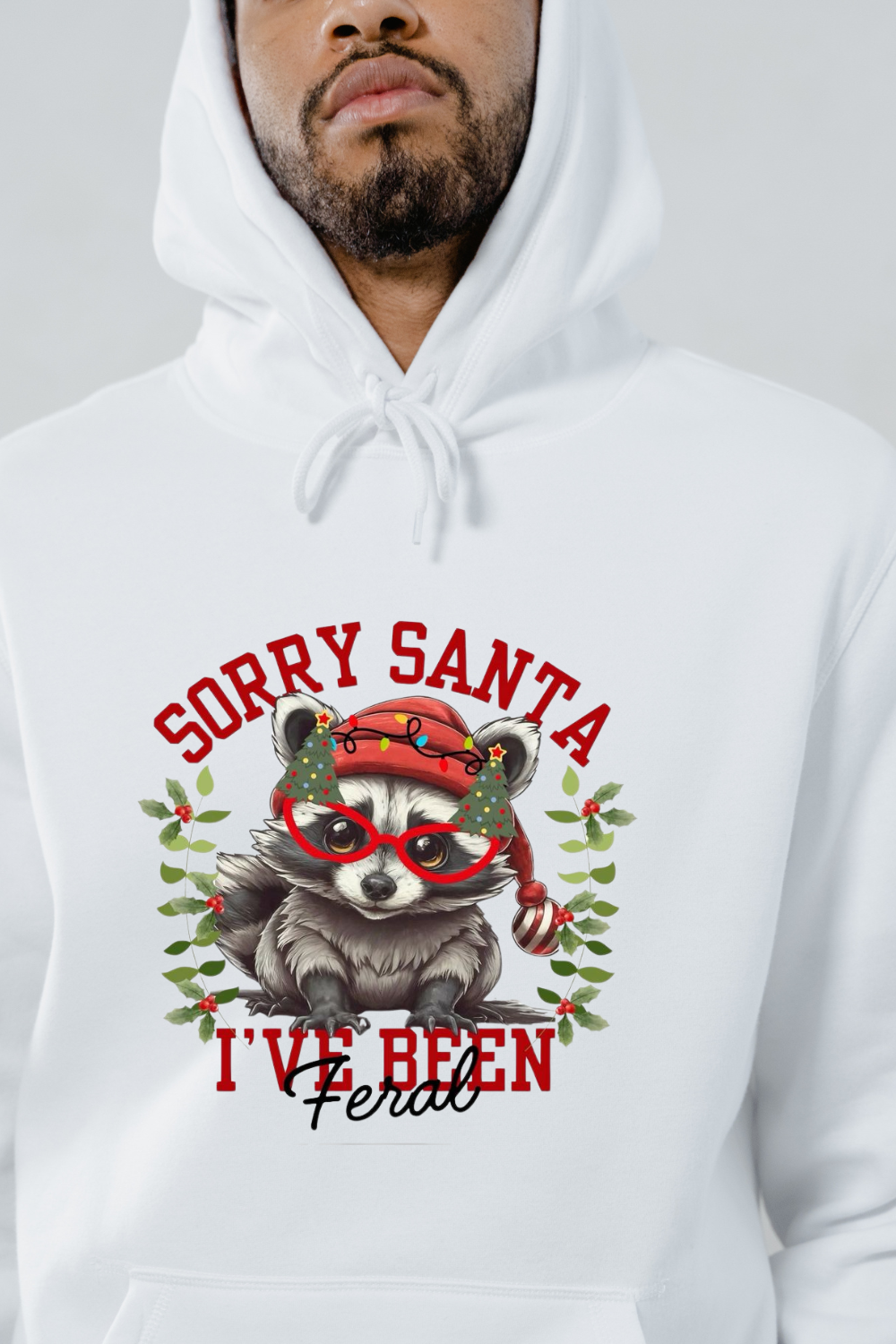 White Sorry Santa Feral Hoodie with raccoon wearing red glasses and festive holiday design