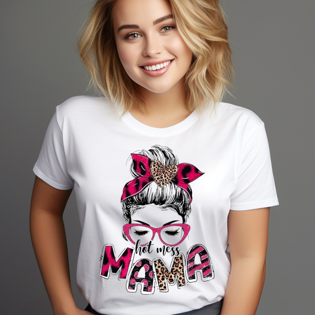 Smiling woman wearing a white hot mess mama shirt with pink and leopard print details
