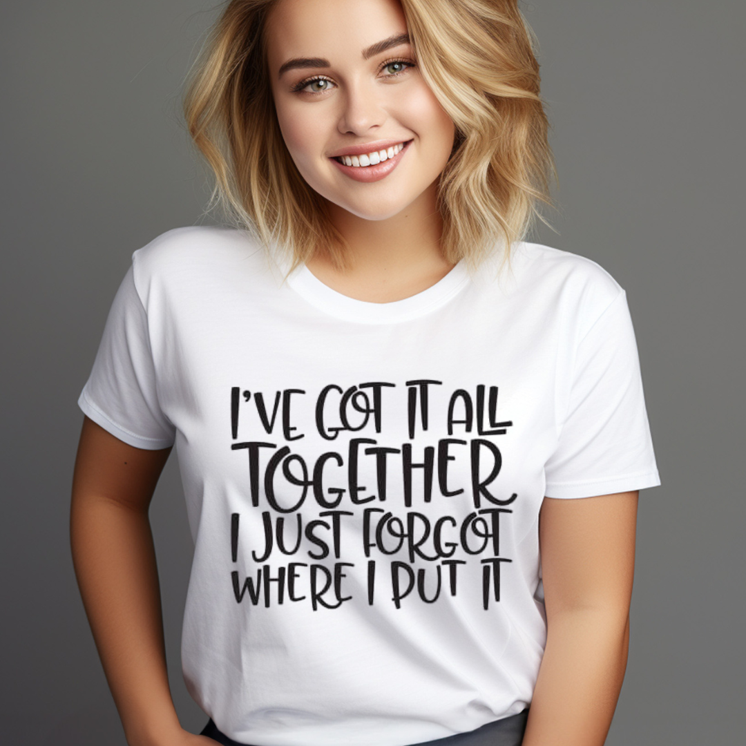Smiling woman wearing white quirky graphic tee sayings shirt with humorous text about forgetting where she put it