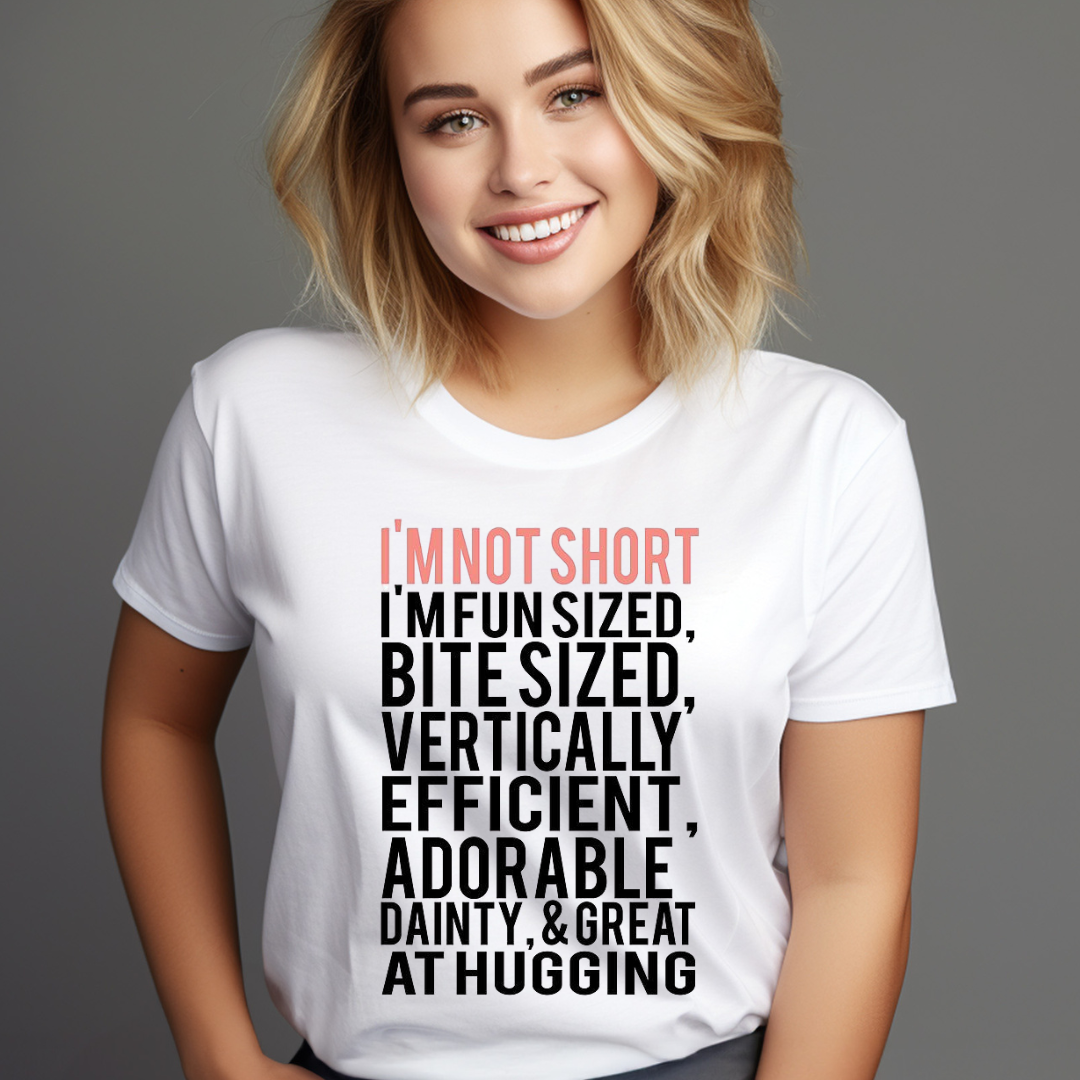 Young woman wearing a white adorable slogan shirt with a fun sized and hugging quote