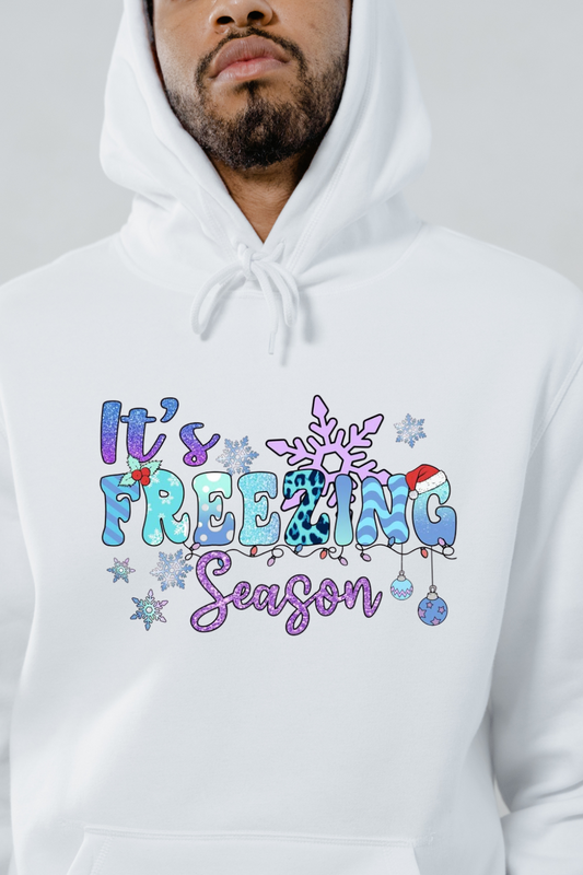 White festive snowflake sweatshirt with colorful freezing season design worn by a man
