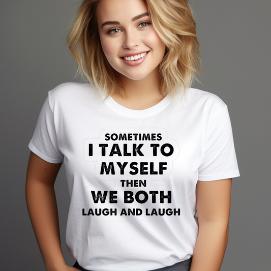 Smiling woman wearing a white funny self-talk t-shirt with black text saying sometimes I talk to myself then we both laugh