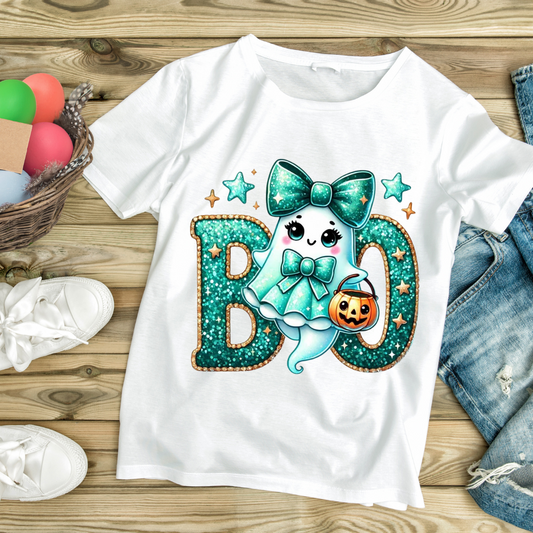White ghost graphic tee featuring a cute ghost with a teal bow and Halloween pumpkin bucket