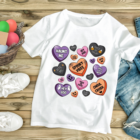 Halloween candy heart shirt by customizable creations with spooky themed colorful hearts on white tee