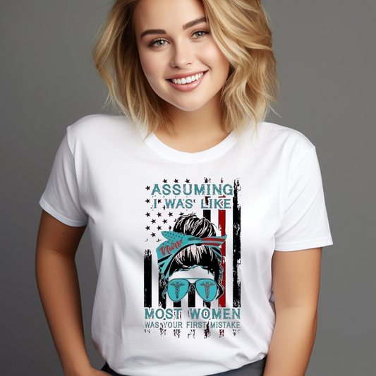 Smiling woman wearing a white nursing profession tee with a graphic design of a nurse and American flag