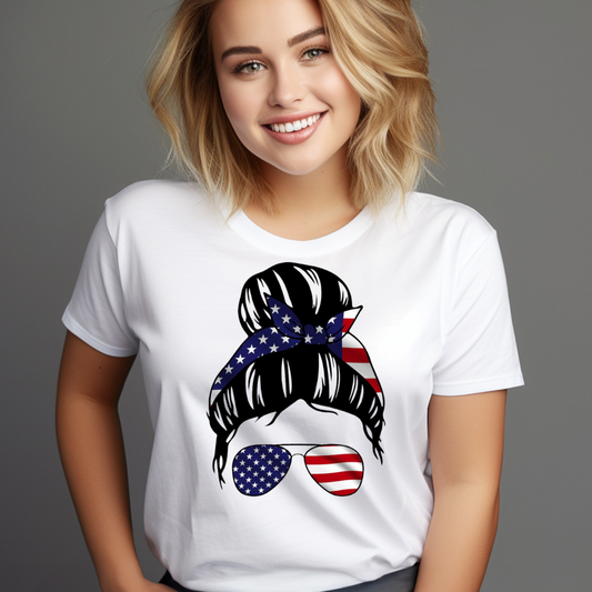 White t-shirt featuring a patriotic bun hairstyle shirt design with American flag bandana and sunglasses