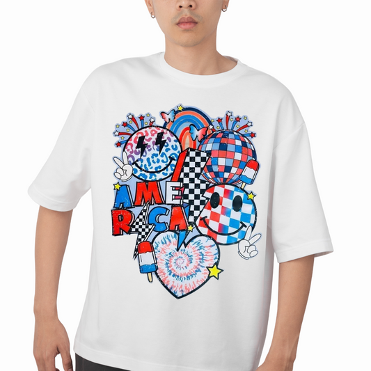 White patriotic graphic t-shirt featuring colorful USA-themed smiley faces and fireworks design