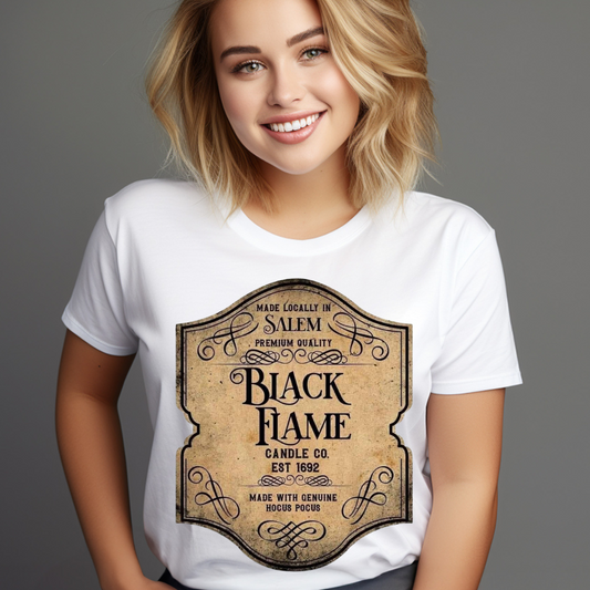 Woman wearing white t-shirt with vintage black flame candle label design from Customizable Creations