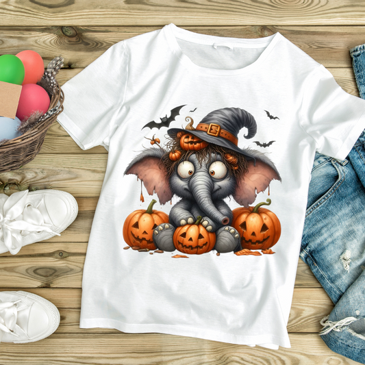 White elephant pumpkin shirt with cartoon elephant in witch hat surrounded by Halloween pumpkins and bats