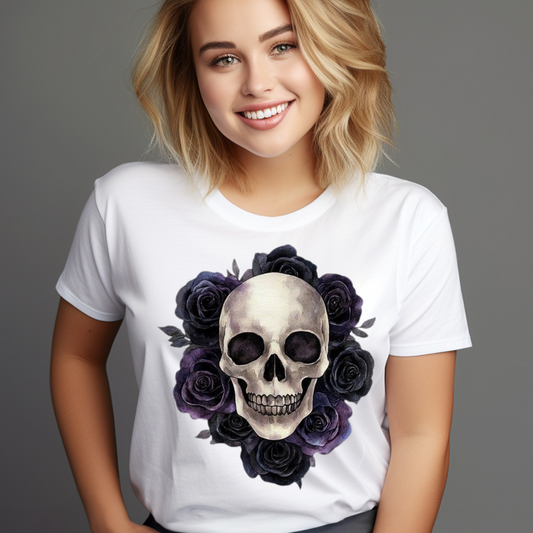 Woman wearing white skull rose t-shirt featuring a skull surrounded by dark purple roses